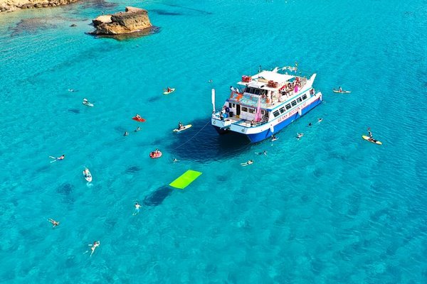 Ibiza Beach Hopping Cruise with Paddleboards, Drinks and Food